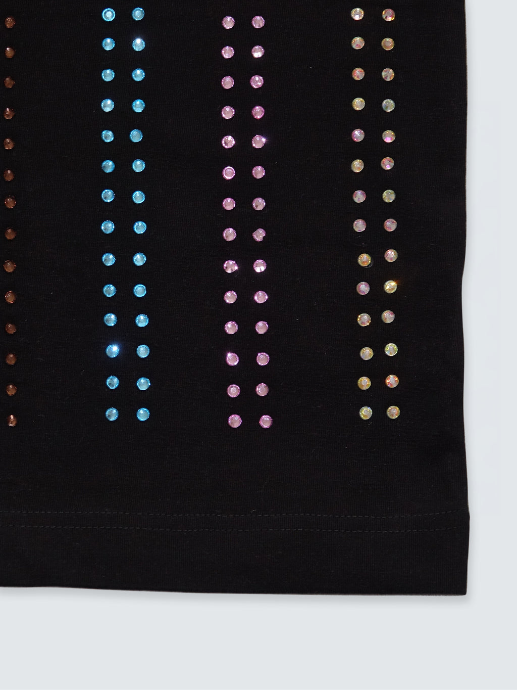 Close-up of rainbow crystal detailing on black gender-free Proud T-shirt by Haus of Mx.