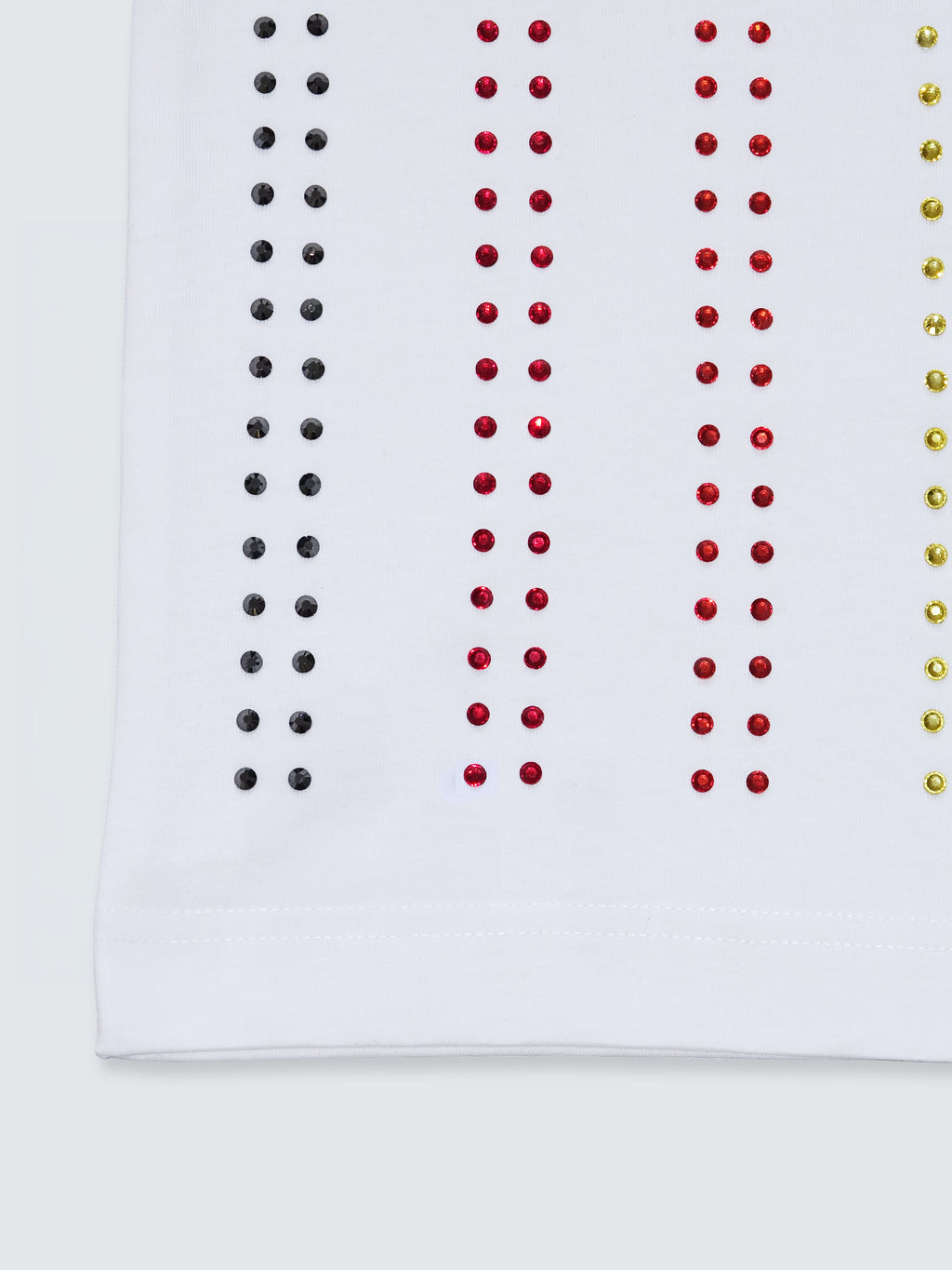 Close-up detail of crystal embellishment on white gender-free Proud T-shirt by Haus of Mx.