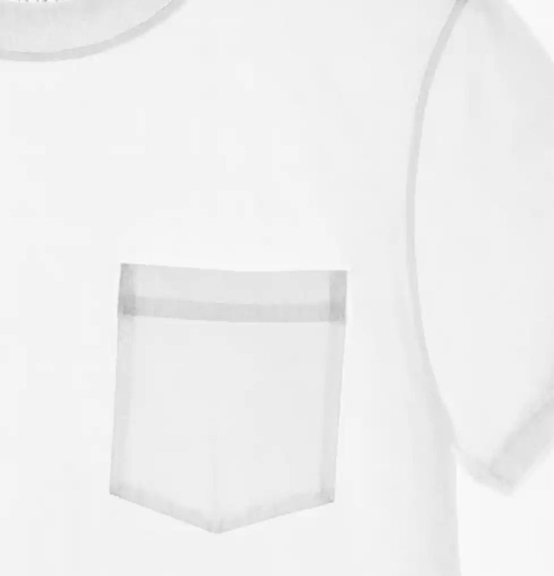 Detail of a white cotton fabric with a pocket — sustainable material focus by Haus of MX